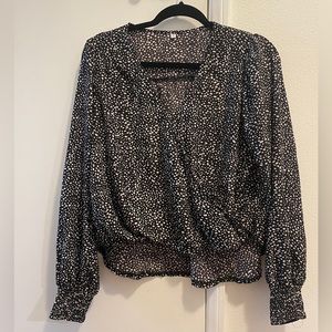Black and white spotted blouse